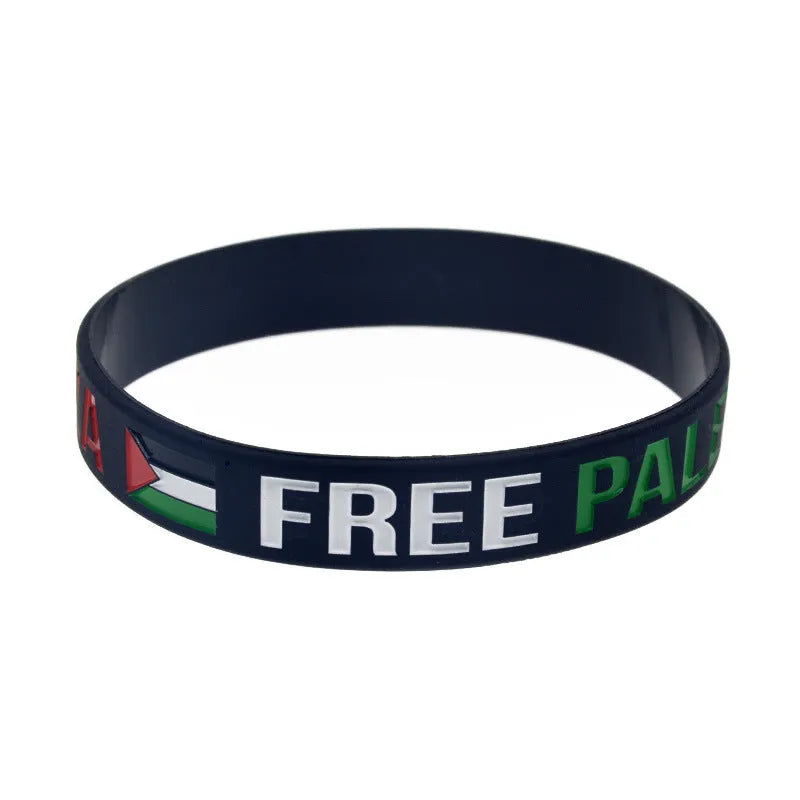 Palestine flag silicone wristband set with black and white bands on display
