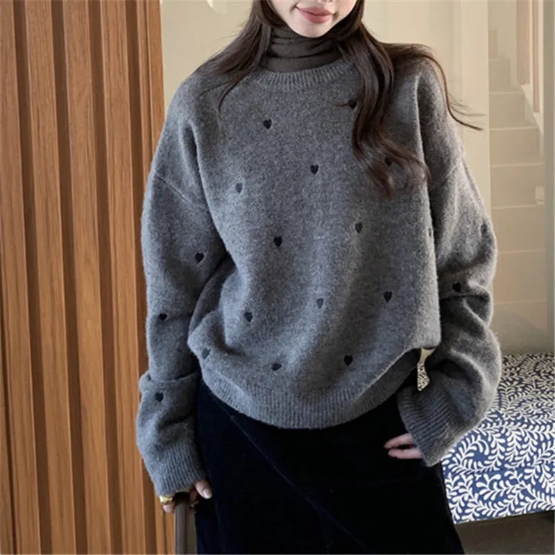 Women's acrylic pullover sweater with embroidery detail in milky white colour