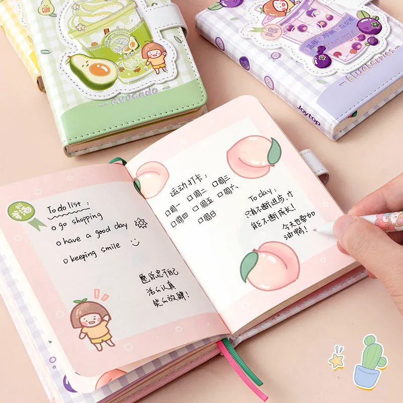 Cute magnetic buckle notebook with heart design in pink, yellow, green, and purple colours on white background