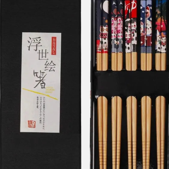 Five pairs of bamboo chopsticks with colourful Japanese lucky cat cartoon design.