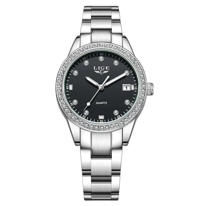 Silver stainless steel fashion quartz watch with diamond accents on dial, showing luminous markers.