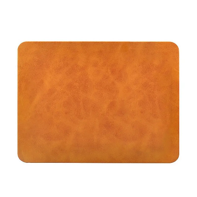 Brown leather wireless charging mouse pad with Qi fast charge capability for computer desks