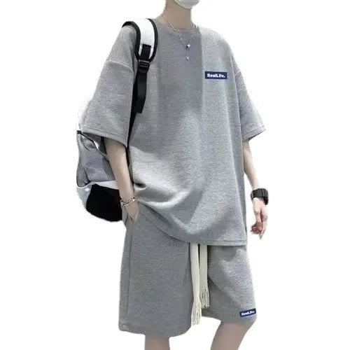 Man's waffle texture leisure sports suit with short sleeves and shorts in blue