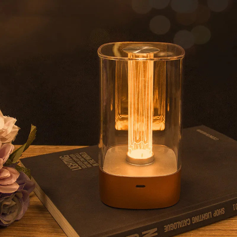 Rose gold LED touch atmosphere light with Auspicious Cloud pattern on a bedside table, USB charging cable included