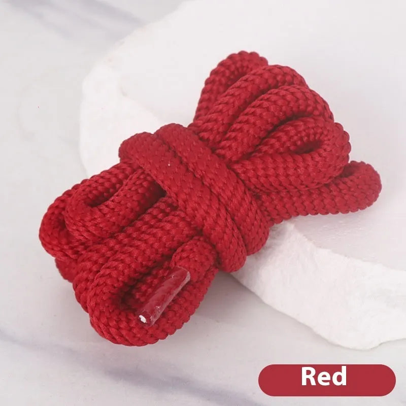 Round 1.0cm wide shoelace adapters in multiple colours including black, pink, blue, and grey on a white background.