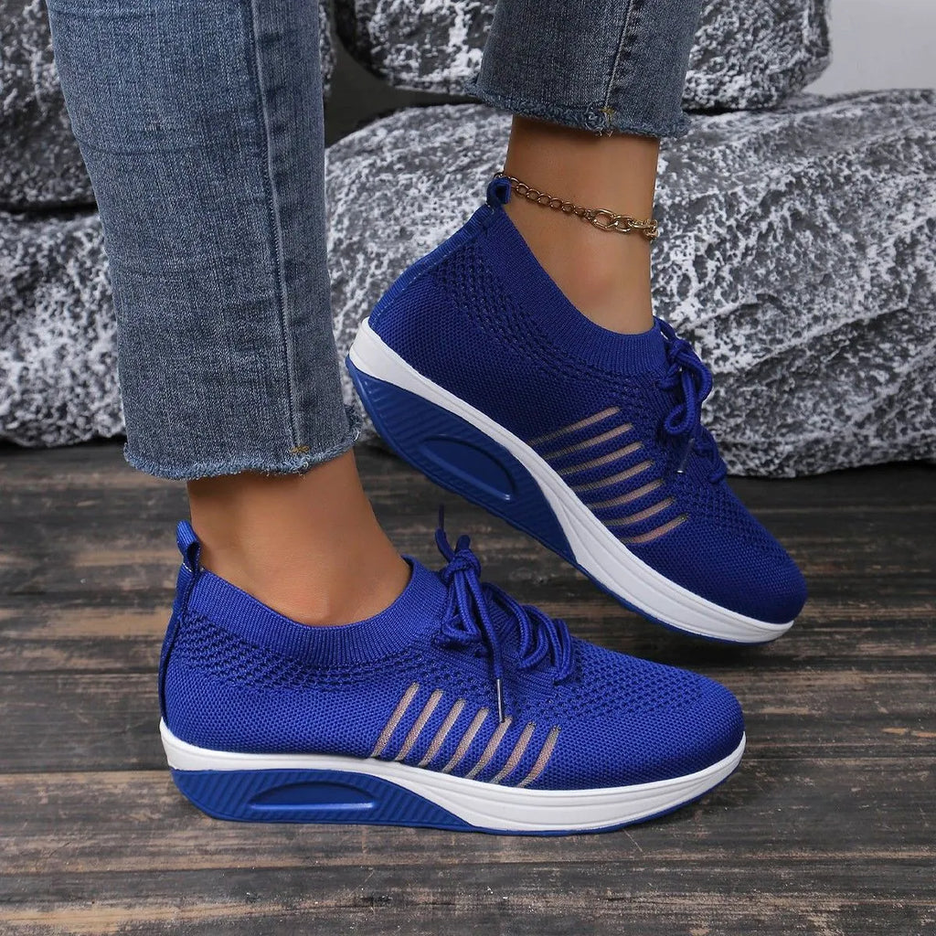 Platform height increasing front lace-up flat shoes for women in black mesh upper and rubber sole with low heel