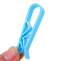 PP plastic bin bag fixing clip attached to rubbish bin side