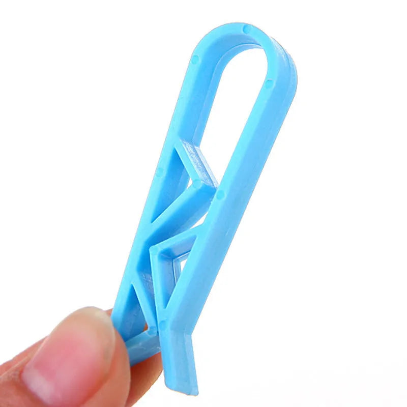 PP plastic bin bag fixing clip attached to rubbish bin side