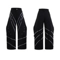 Men's black trousers with metal striped rivet details, pleated front, and a structured three-dimensional cut.