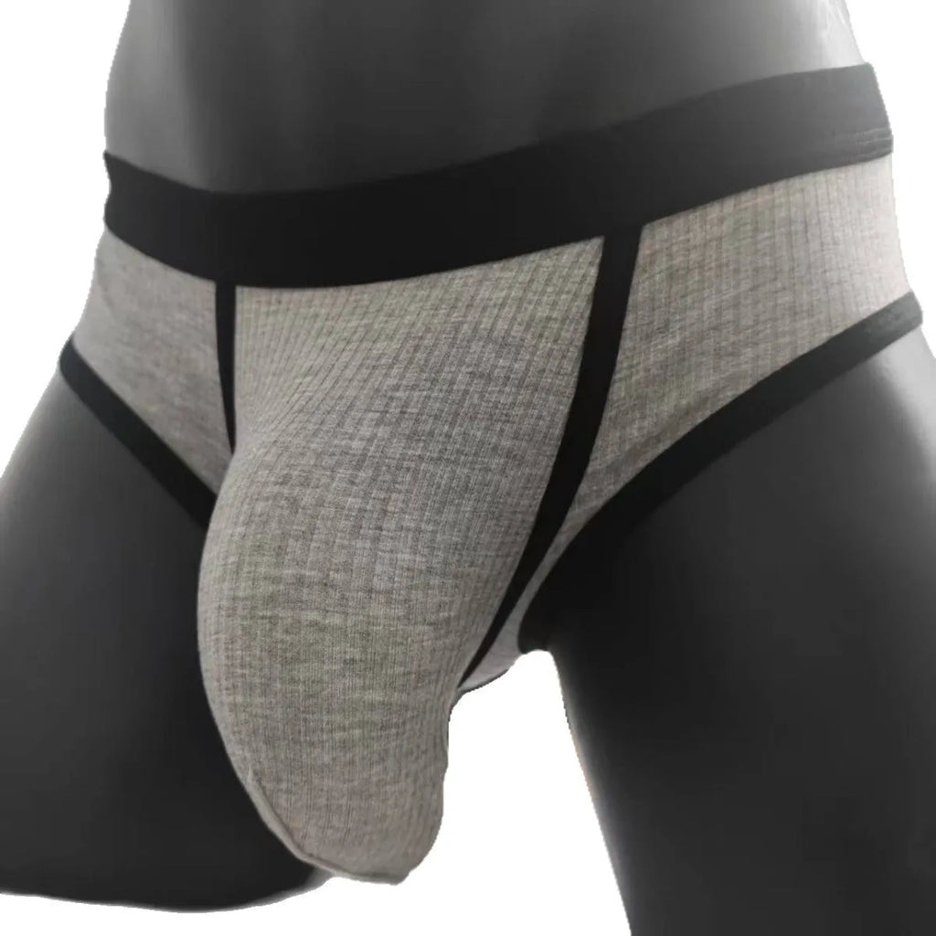 Men's triangle breathable knitted viscose U-shaped big bag underwear in solid colour shown on model