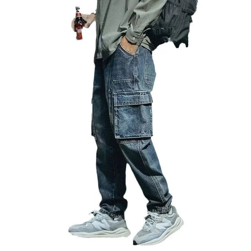 Men's blue loose straight leg jeans with retro styling and zip fly opening