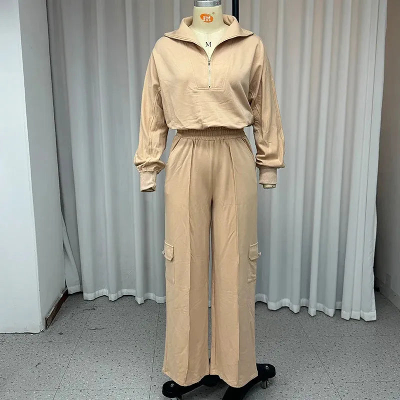 Women in light camel lapel short top and high-waist wide leg trousers two-piece set with long sleeves