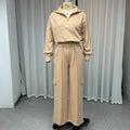 Women in light camel lapel short top and high-waist wide leg trousers two-piece set with long sleeves