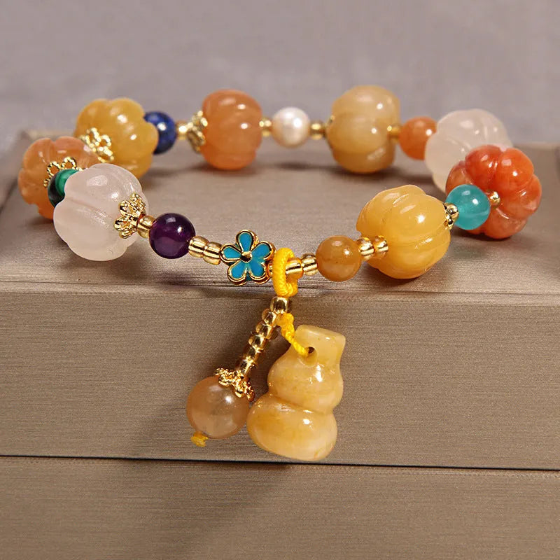 Yellow agate and crystal women's bracelet on gold silk cord with adjustable design