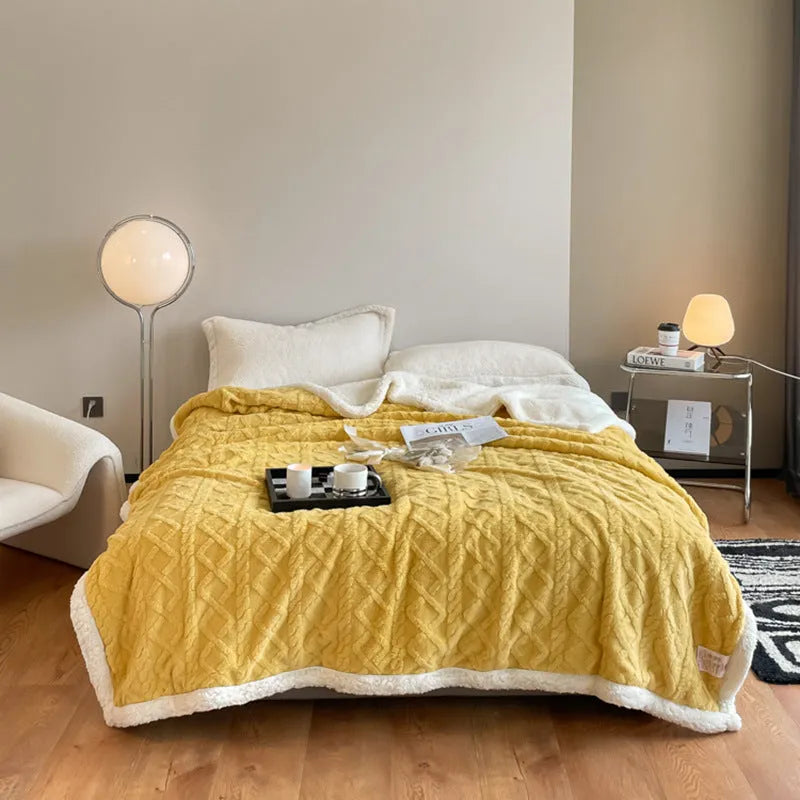 Polyester thermal flannel casual blanket in beige, shown folded, for winter bed or sofa use.