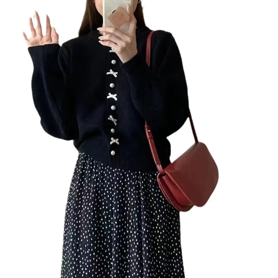 Women's acrylic fibre cardigan with bow detail and pearl buttons in solid colour options