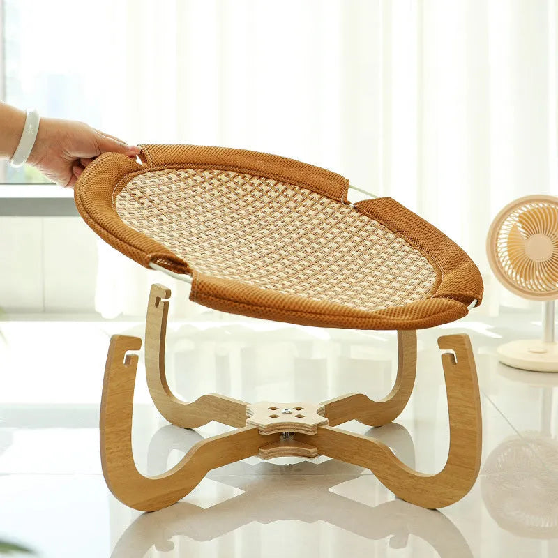 Brown woven rattan pet cooling bed hammock measuring 46cm square and 17.5cm high.