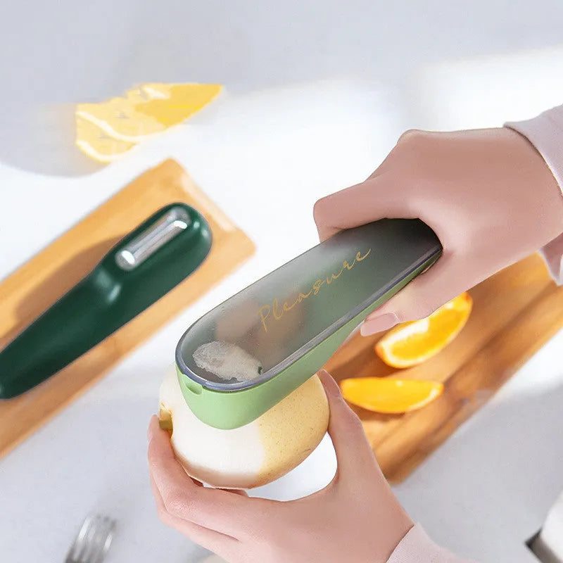 Storage type peeling knife with tube, stainless steel blade, non-slip plastic handle, 20 x 4.8cm, dark green and light green colours