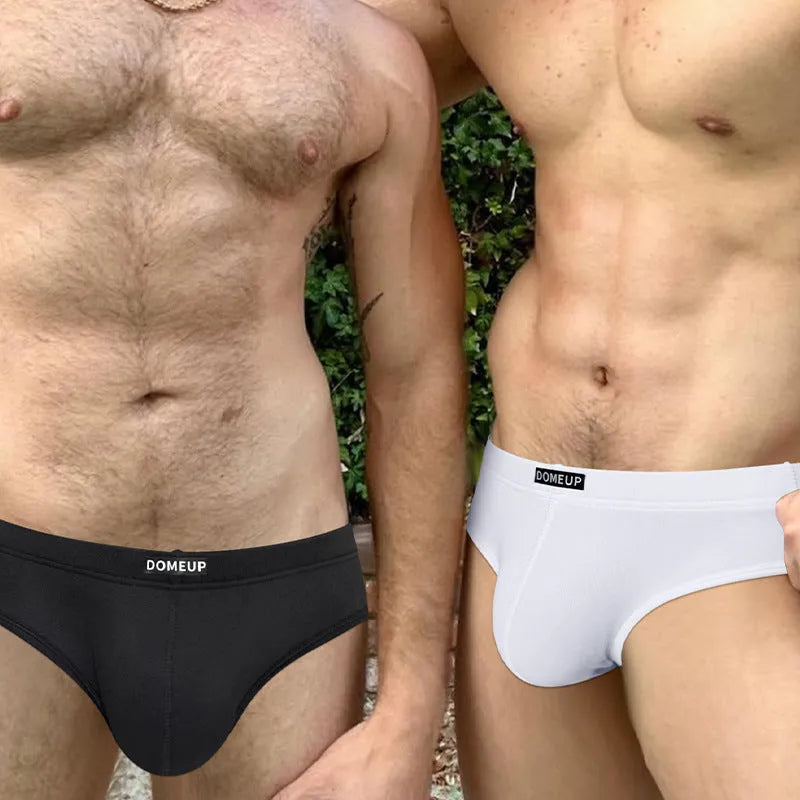 Men's solid colour low waist briefs in white, seamless and breathable design.