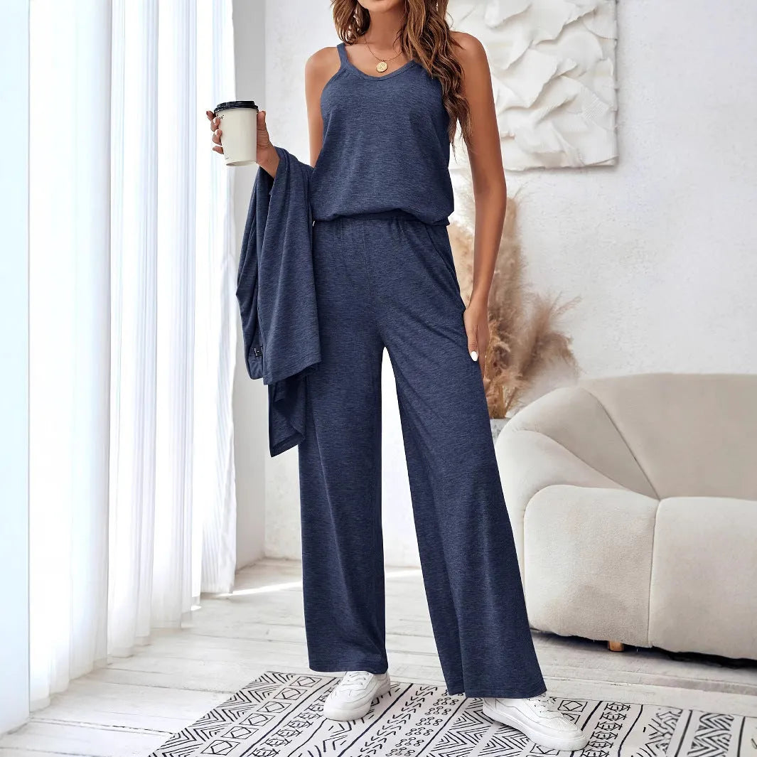 Women's blue polyester co-ord suit set with sling top, long cardigan, trousers and suspenders