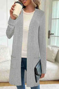 Loose fit knitted cardigan jacket in black colour with long sleeves and open front design