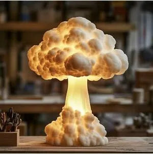 Atomic bomb mushroom cloud shaped decorative USB table lamp on a table.