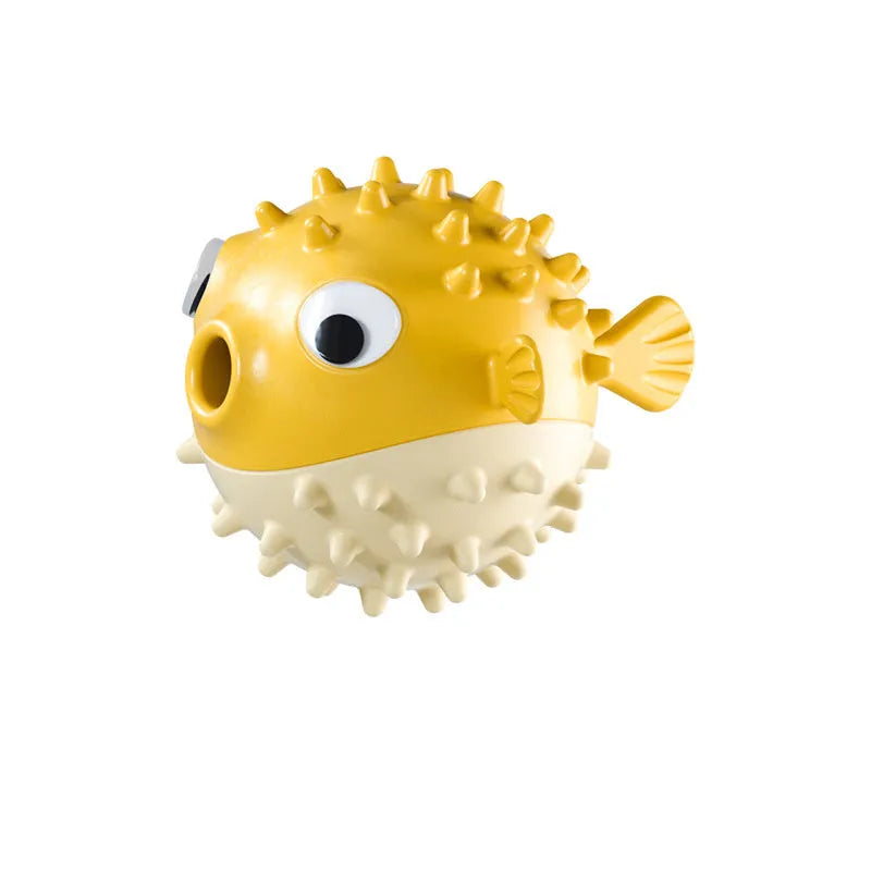 Green fish-shaped interactive dog toy with textured surface for dental cleaning