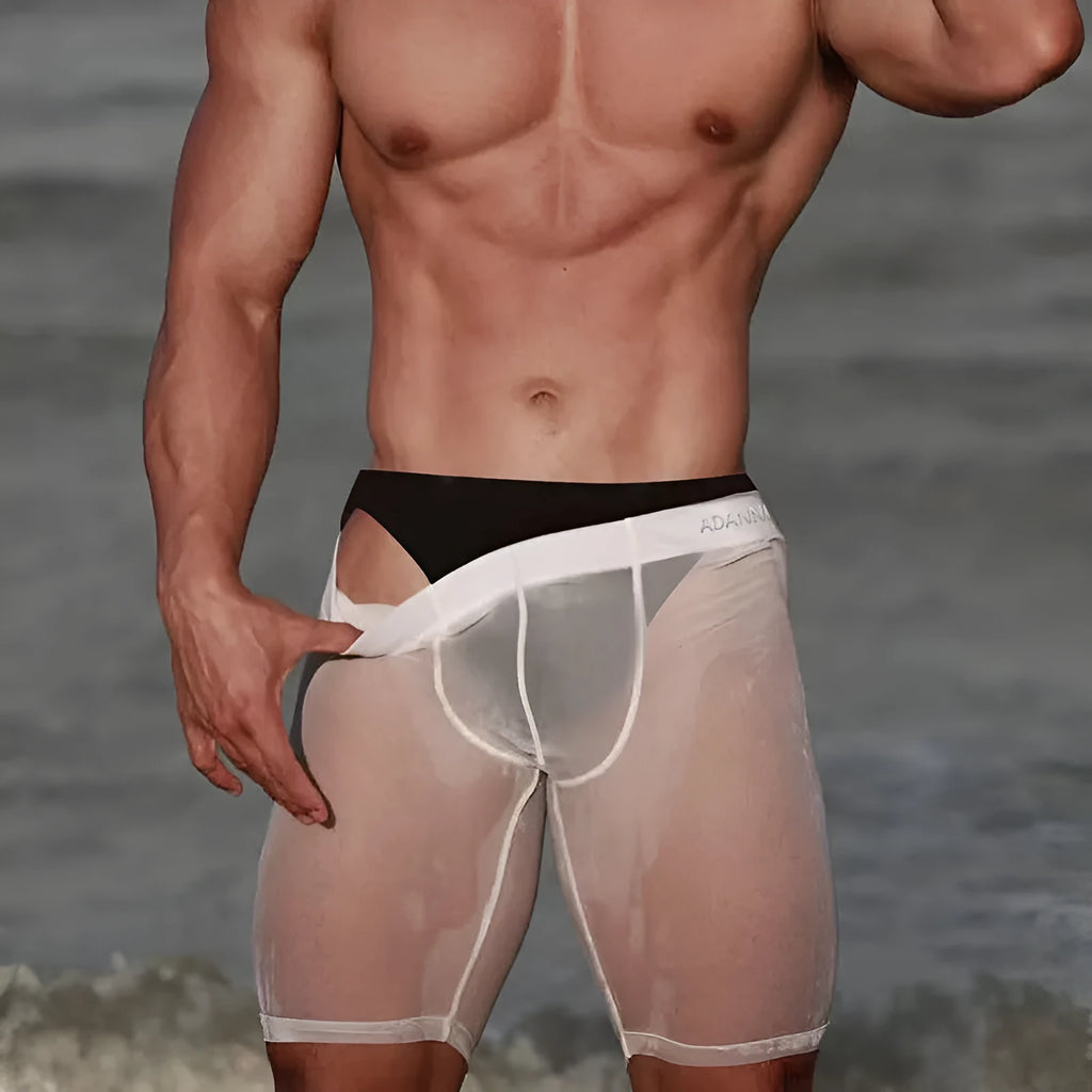 Men's solid colour mesh shorts in black, seamless knit construction.