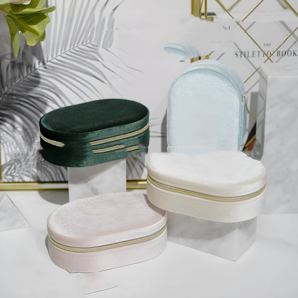 Oval velvet jewellery storage box in multiple colours with flannel lining