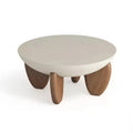 White solid wood coffee table with height adjustable legs and storage in a living room setting