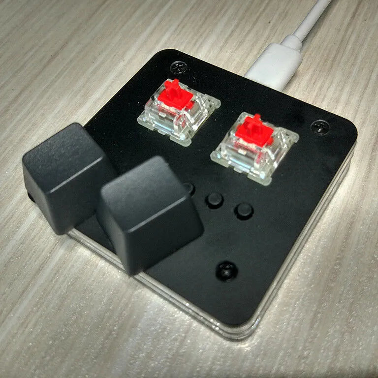 Compact plastic USB keyboard with multimedia keys in black, grey, pink or white colour options