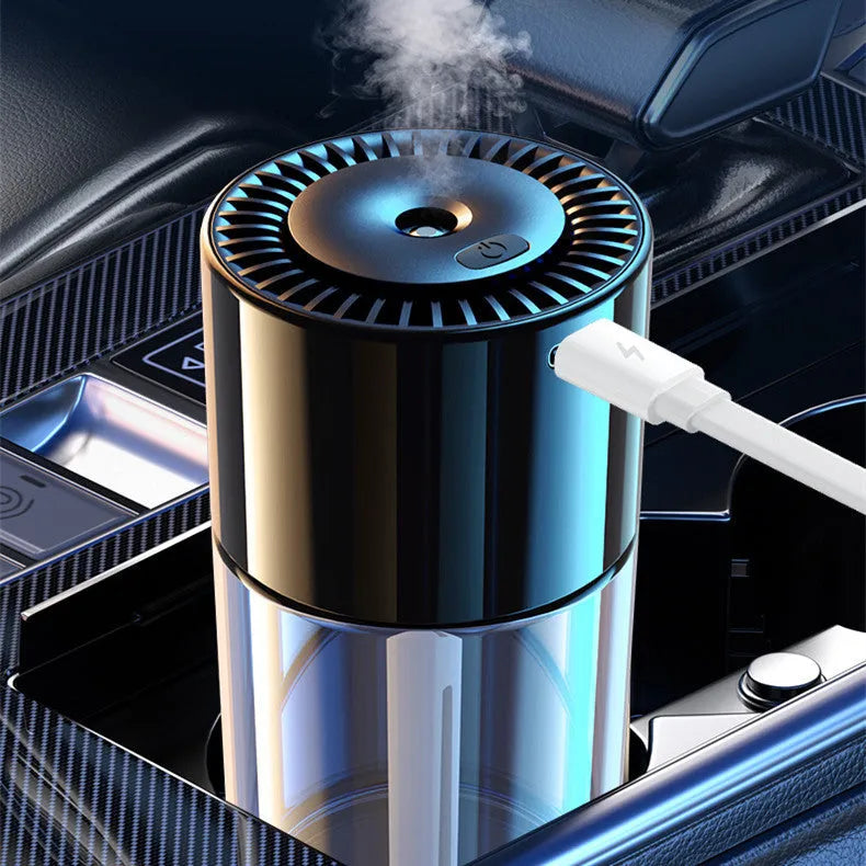 Plug-in USB spray perfume humidifier with glass base in a choice of six fragrance colours.