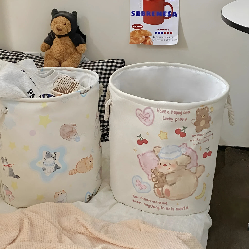 Foldable cotton laundry basket showing one of twelve colour patterns including animal motifs