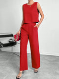 Red sleeveless top and wide-leg trousers two-piece set on a hanger.