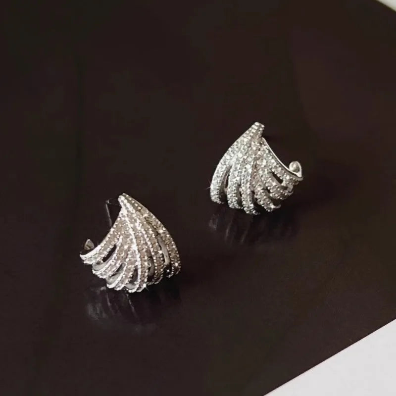 Geometric platinum electroplated zircon earrings for women with European and American style design