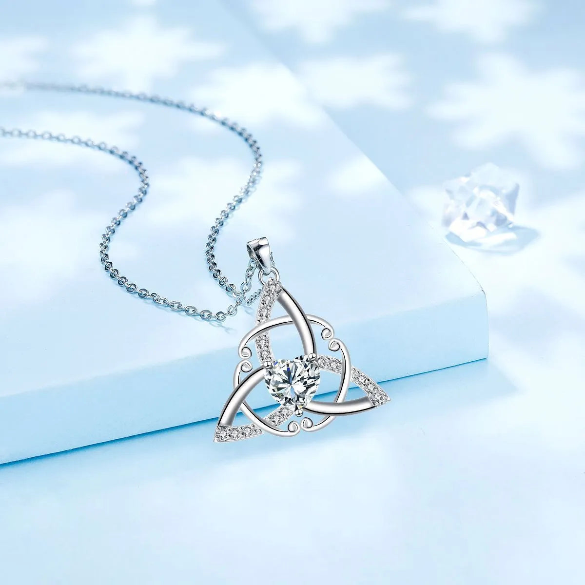 Copper Celtic knot necklace with geometric pendant design in choice of four electroplated colours