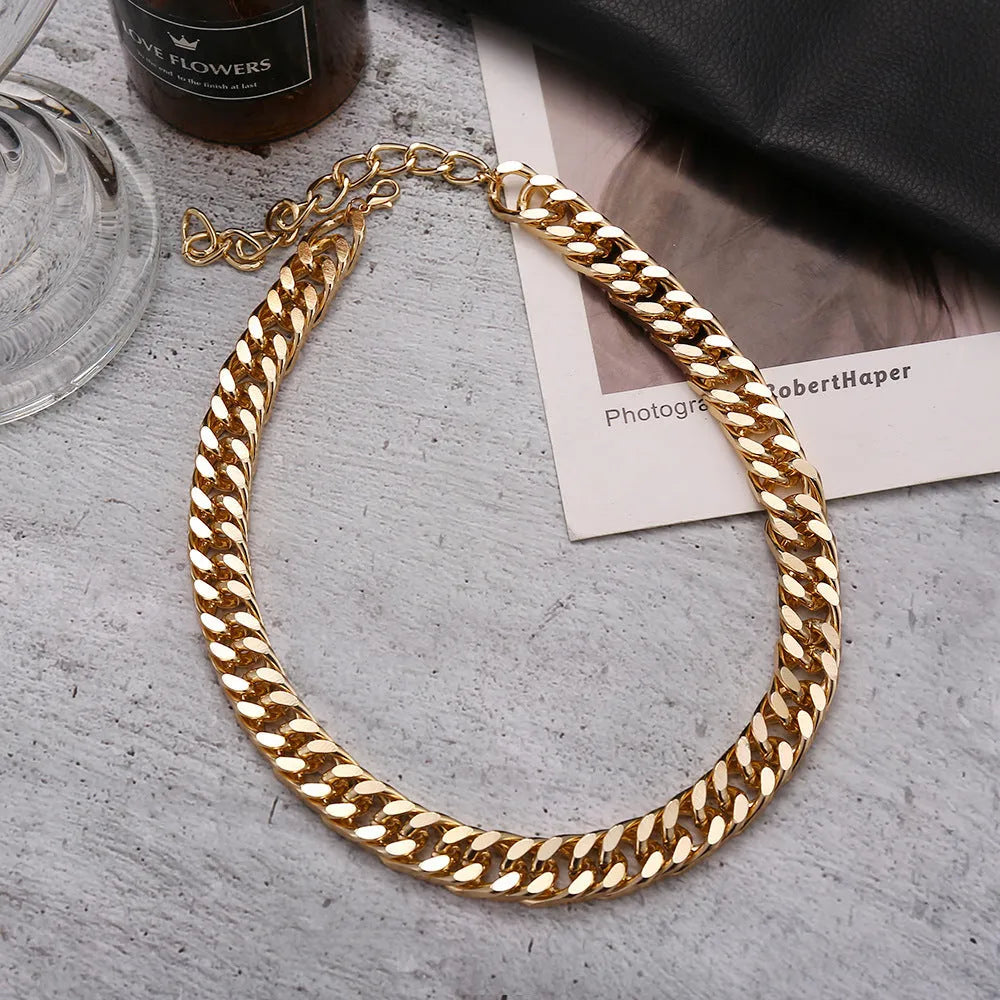 Gold women's thick chain necklace showing 6cm width and 32cm length with electroplated alloy construction