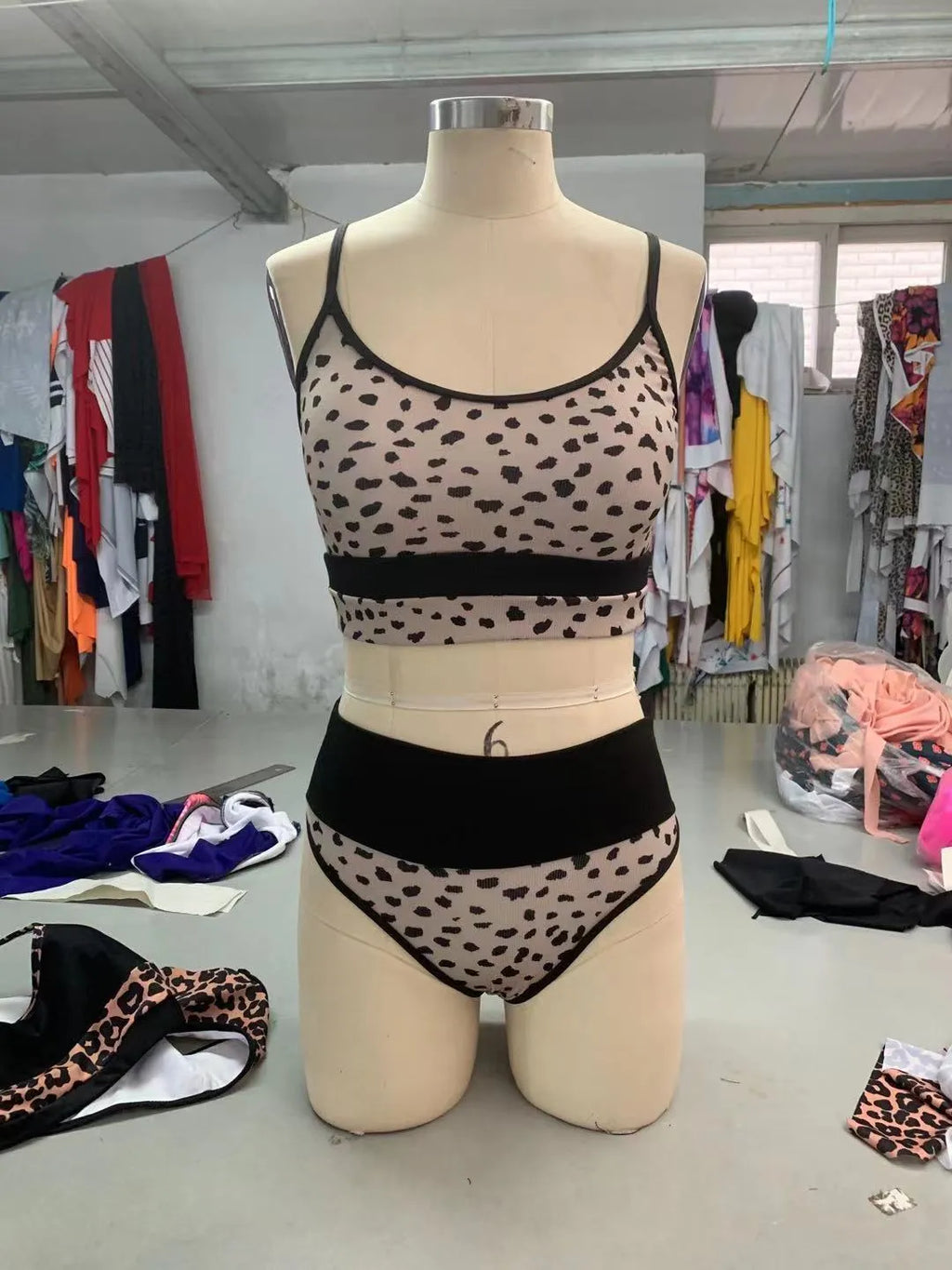 Women's high waist split bikini swimsuit in leopard print or white colour with nylon fabric