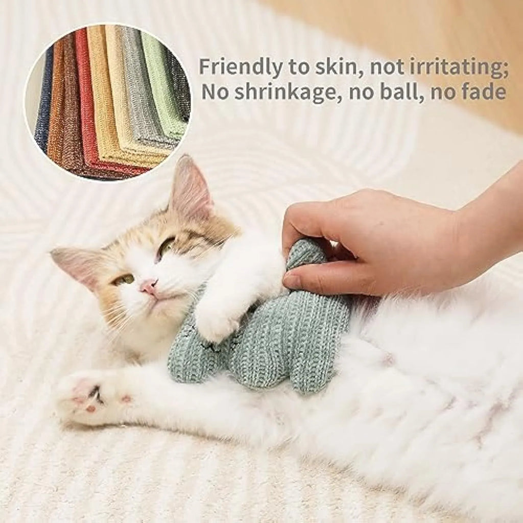 Cyan knitted plush catnip toy with bell, sized 12 by 11 centimetres.