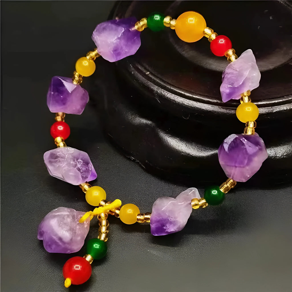 Natural shaped amethyst bead bracelet for women with a fu character charm.