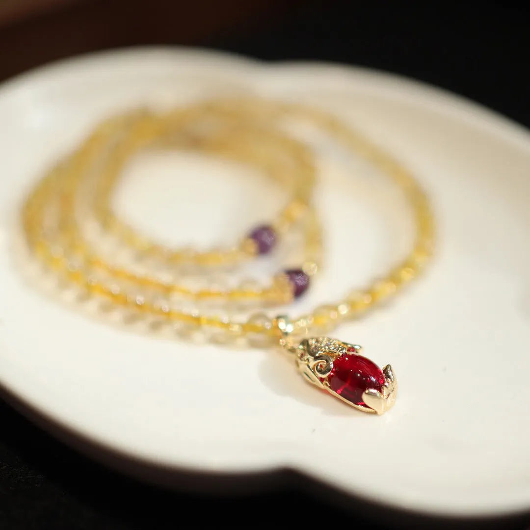 Brazilian rutilated quartz bracelet with three-circle gold chain and Chinese-style design
