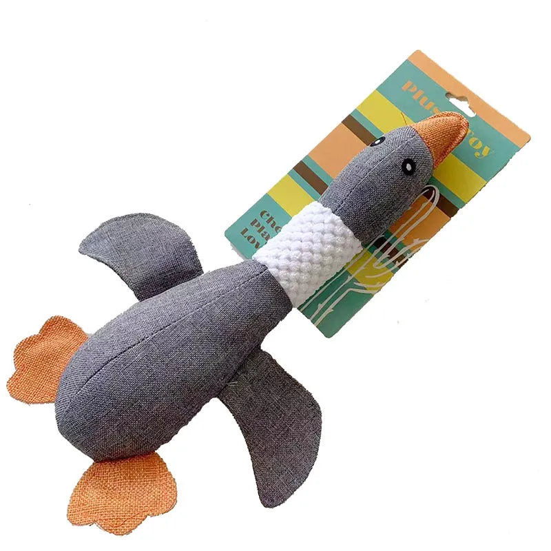 Blue durable duck dog plush toy with squeakers on a white background