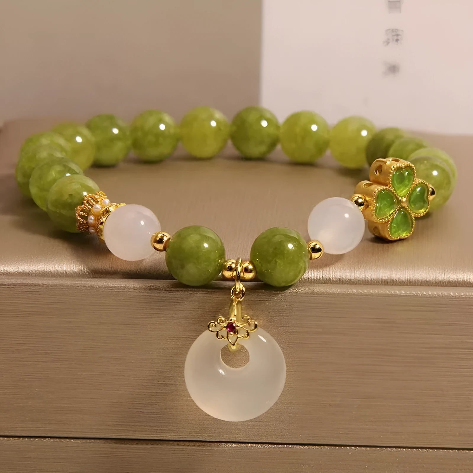 Natural stone green tourmaline women's bracelet with four-leaf clover safety buckle in New Chinese style drop shape geometric design green colour