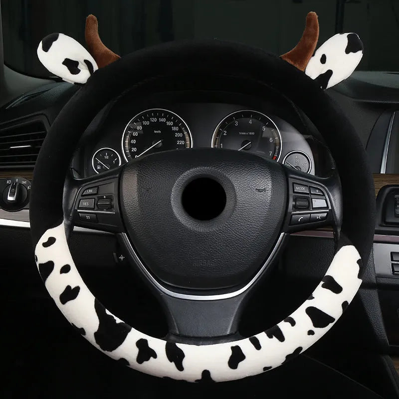 Short plush car steering wheel cover in coffee colour showing protective handle detail