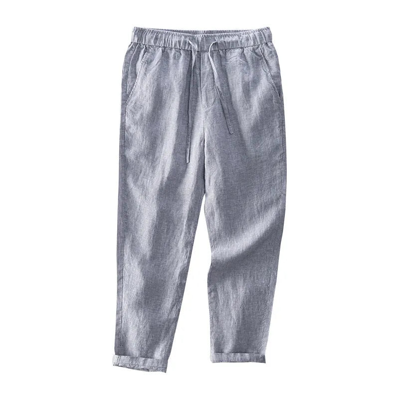 Linen breathable straight trousers for men in khaki colour, mid-waist cut on white background