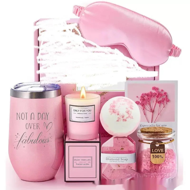 Aromatherapy gift box containing soy wax candles and bath products in modern simplicity design.