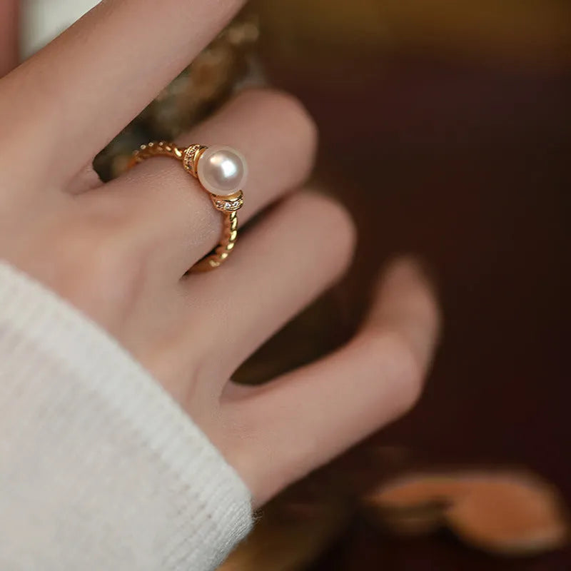 Adjustable copper pearl ring with antique twist geometric design in gold or silver colour