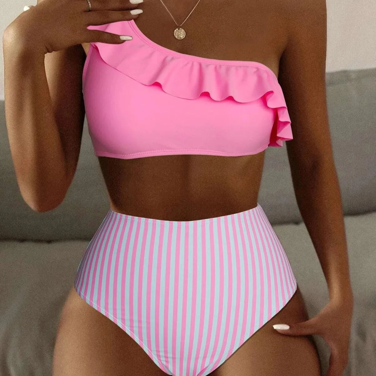 Striped split bikini women's swimsuit in solid colour, two piece, triangle top, cheeky bottom, high cut sides.