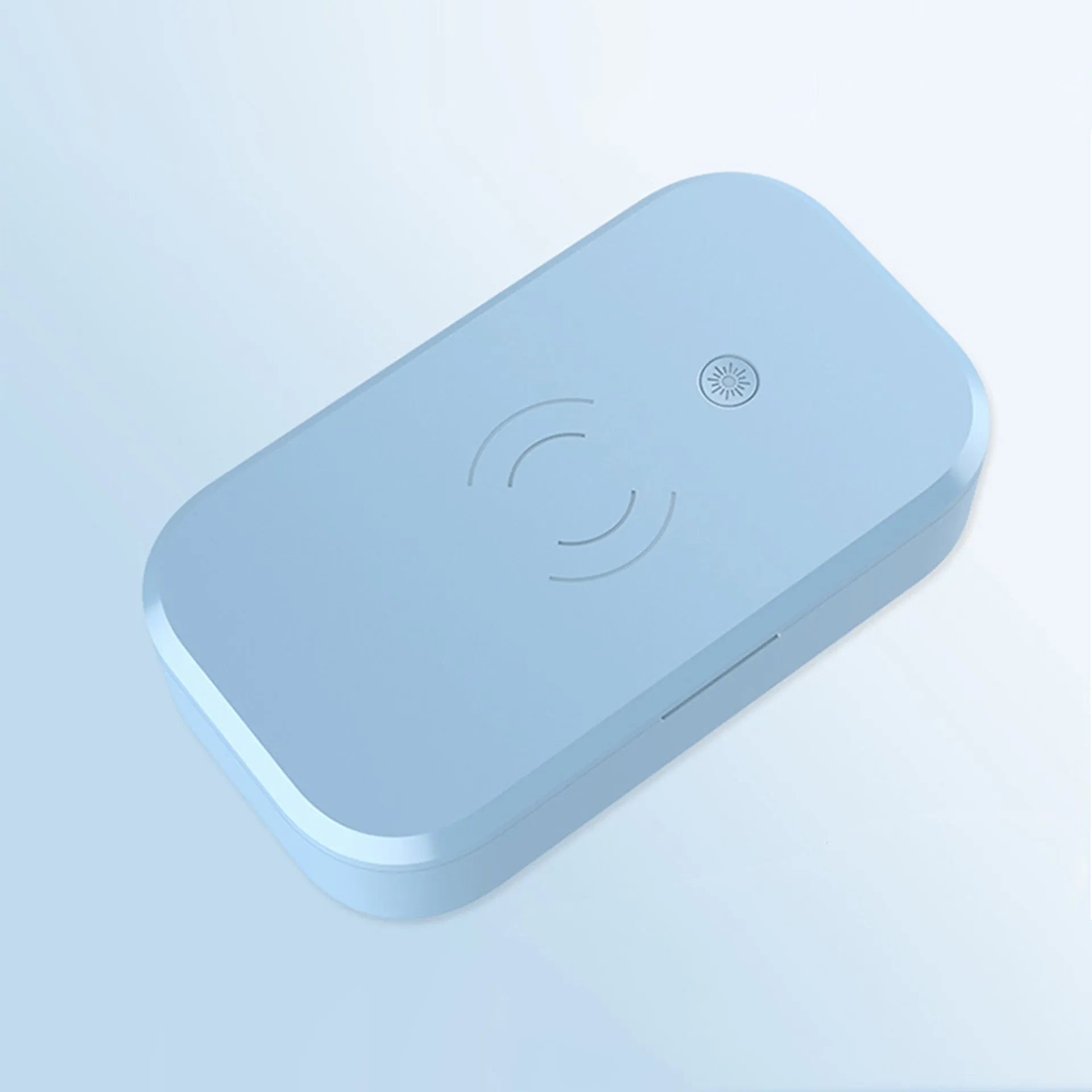 A white ultraviolet disinfection box with wireless phone charging function and USB cable.
