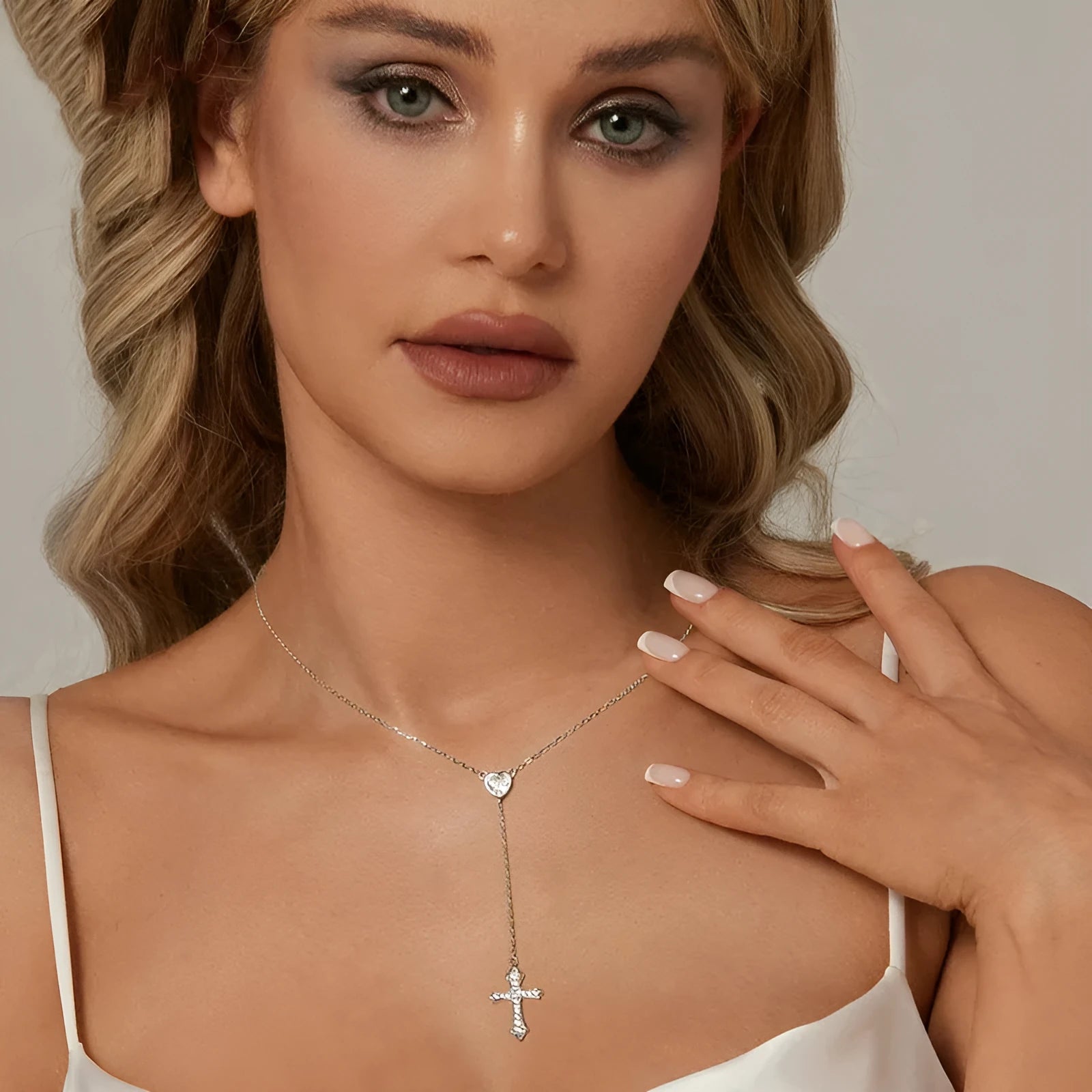 Silver cross necklace with V-neck pendant on an O-ring chain for women